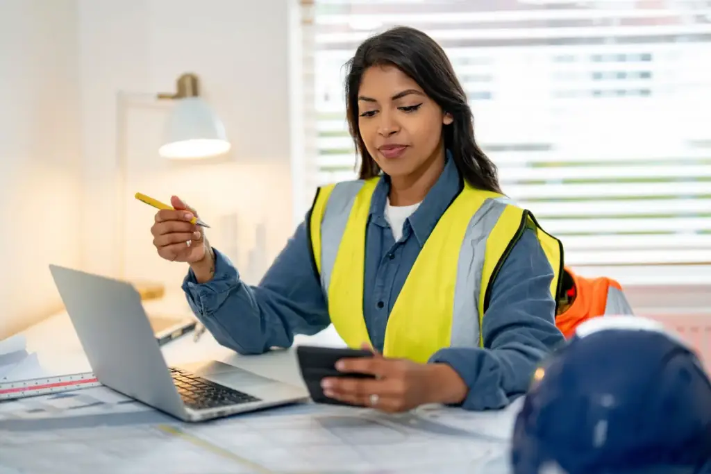 A female construction manager working on her taxes