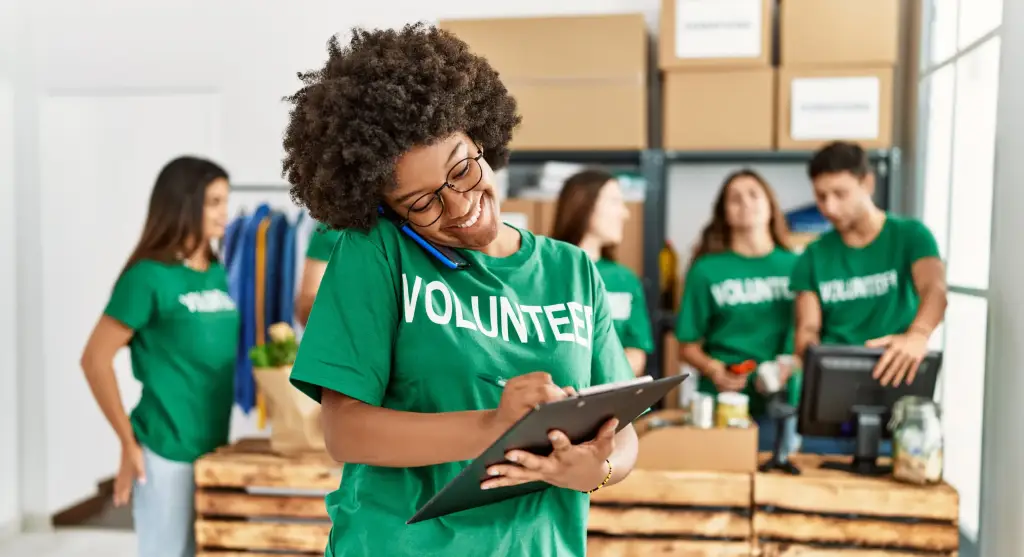 a group of volunteers working together in the community