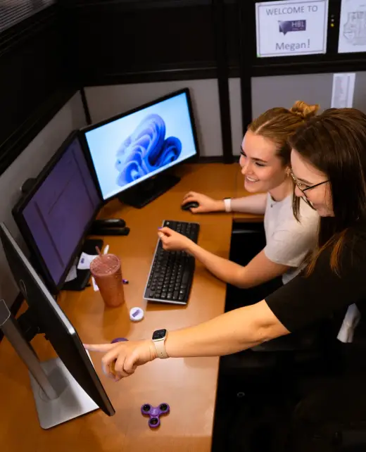 HBL working at the desk